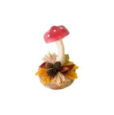 Un grand champignon rouge à pois blanc sur un socle d'automne | jourdefete.com