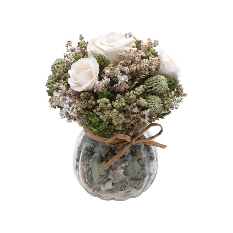 Mug En Verre Incolore Avec Bouquet De Fleurs Sur Table